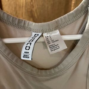 Sleeveless, cream colored dress. Size small.